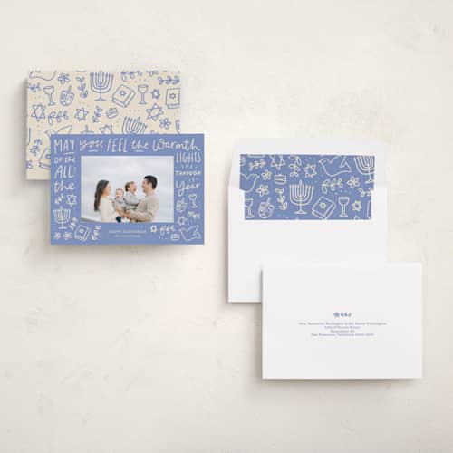 This is a robin blue hanukkah cards with standard by Abbigail Lim called warmth of the lights printing on recycled smooth signature in standard