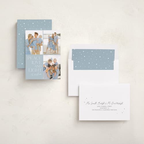 This is a cornflower hanukkah cards with standard by Erin Deegan called peace love light printing on recycled smooth signature in standard