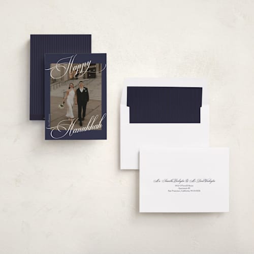 This is a navy hanukkah cards with standard by Beth Vassalo called flowing light printing on recycled smooth signature in standard