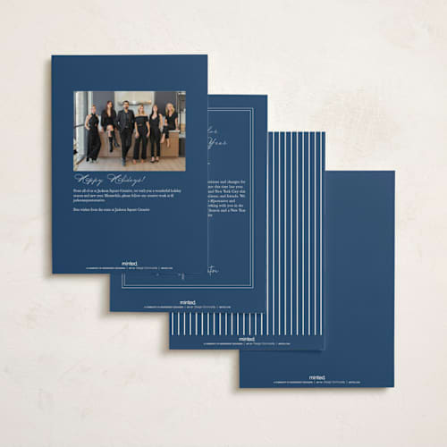 This is a blue spruce business holiday cards with foil pressed by Amy Kross called edged printing on signature in standard