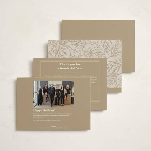 This is a snow business holiday cards with foil pressed by Amy Kross called spread cedars printing on signature in standard