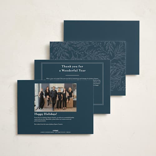 This is a juniper business holiday cards with foil pressed by Amy Kross called spread cedars printing on signature in standard