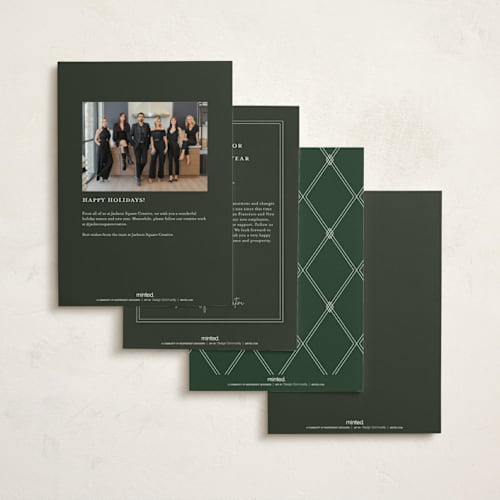 This is a greenery business holiday cards with foil pressed by Erin L. Wilson called flora printing on signature in standard