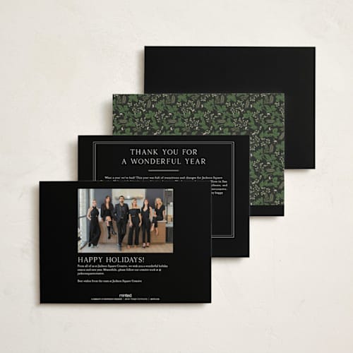 This is a pine business holiday cards with foil pressed by Susan Moyal called happy holiday printing on signature in standard