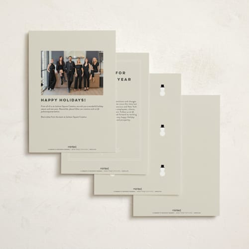 This is a eggnog business holiday cards with standard by Louise Kay called holiday team printing on signature in standard