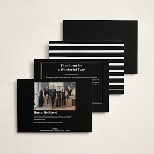 This is a noir business holiday cards with standard by Bethan called bold type printing on signature in standard