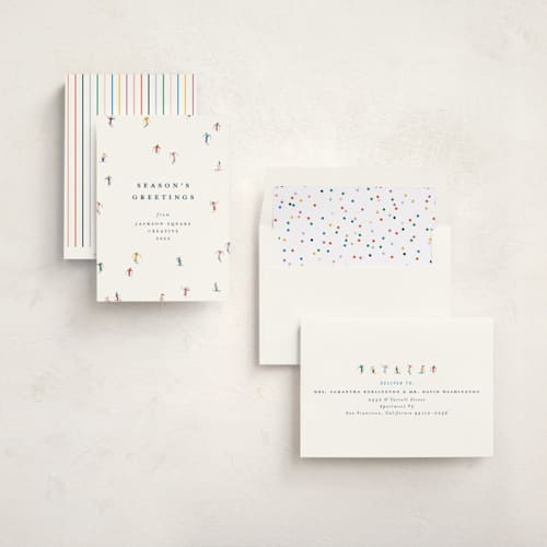 This is a multi business holiday cards with standard by Ellen Schlegelmilch called festive skiers printing on signature in standard