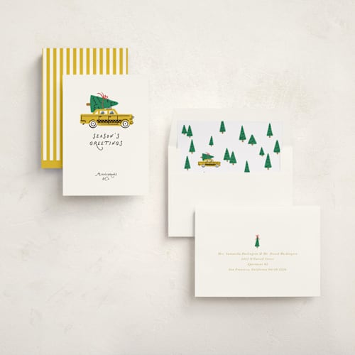 This is a taxi business holiday cards with standard by mo kelley called tree transport taxi printing on signature in standard