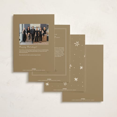 This is a champagne business holiday cards with standard by Ani Somi called a very merry holiday cheers printing on signature in standard