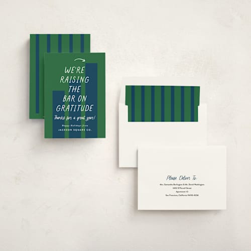 This is a winter business holiday cards with standard by Louise Kay called raising the bar printing on signature in standard