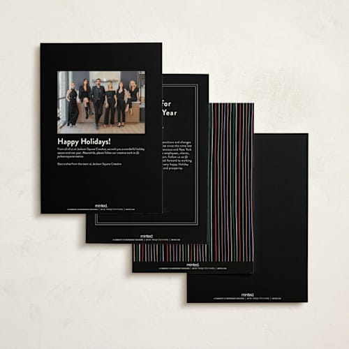 This is a eclipse business holiday cards with standard by Pixel and Hank called holiday city printing on signature in standard