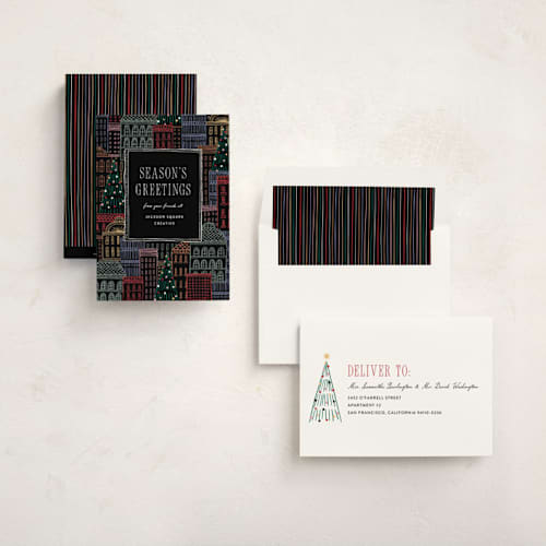 This is a eclipse business holiday cards with standard by Pixel and Hank called holiday city printing on signature in standard