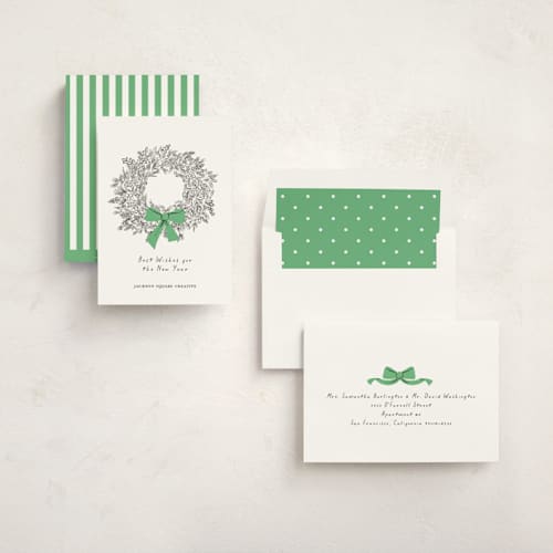 This is a greenery business holiday cards with standard by mo kelley called wreath with bow printing on signature in standard