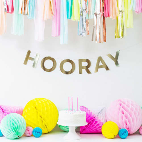 This is a gold holiday decorations by Jollity and Co called gold say everything garland set in standard