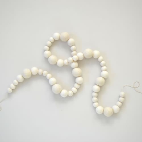 This is a white holiday decorations by TwentyEight12 called felt christmas garland, white boho felt balls in standard