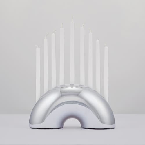 This is a pink holiday decorations by Leadoff Studio called nosh menorah - chrome in standard