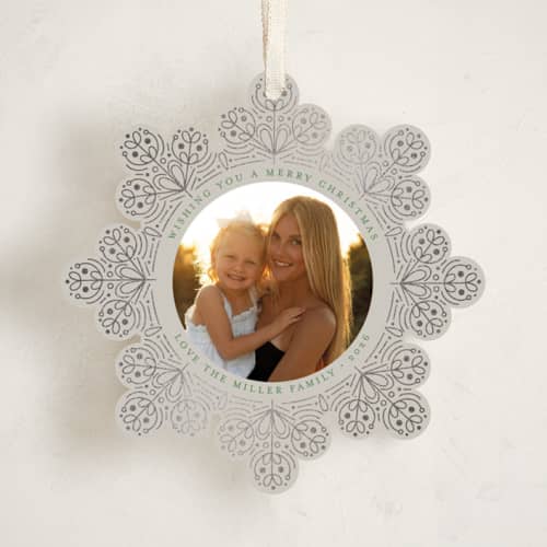 This is a snowfall holiday card ornaments with foil pressed by Amy Payne called scandinavian snowflake printing on recycled smooth signature in ornament