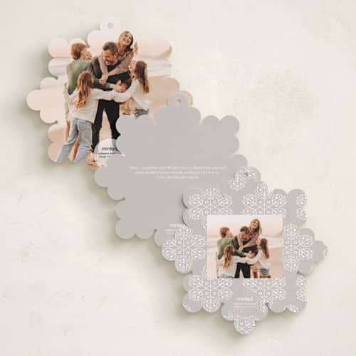 This is a snowfall holiday card ornaments with foil pressed by Amy Payne called scandinavian snowflake printing on recycled smooth signature in ornament