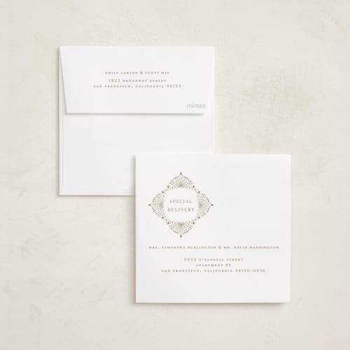 This is a snow holiday card ornaments with foil pressed by Ana de Sousa called poinsettia ornament printing on signature in ornament
