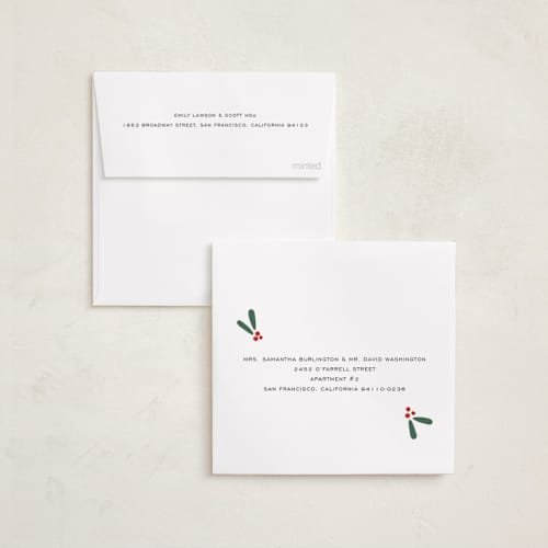 This is a garland holiday card ornaments with foil pressed by Antonia Jae Krajicek called painted wreath gilded printing on recycled smooth signature in ornament