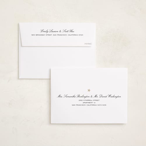 This is a champagne foil pressed holiday cards with foil pressed by Ani Somi called merry stars printing on recycled smooth signature in standard