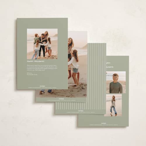 This is a pistachio foil pressed holiday cards with foil pressed by Amy Kross called nicholas printing on recycled smooth signature in standard
