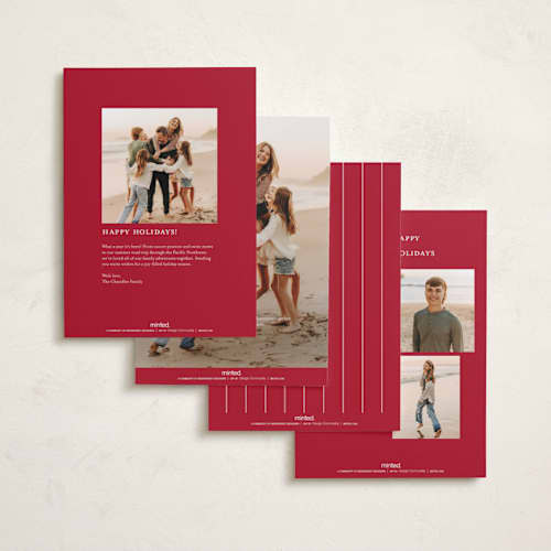 This is a poinsettia foil pressed holiday cards with foil pressed by Kelly Schmidt called sideways merry printing on recycled smooth signature in standard