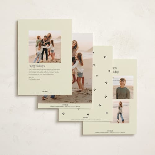 This is a champagne foil pressed holiday cards with foil pressed by Rachel Cassel called it's spaced printing on recycled smooth signature in standard