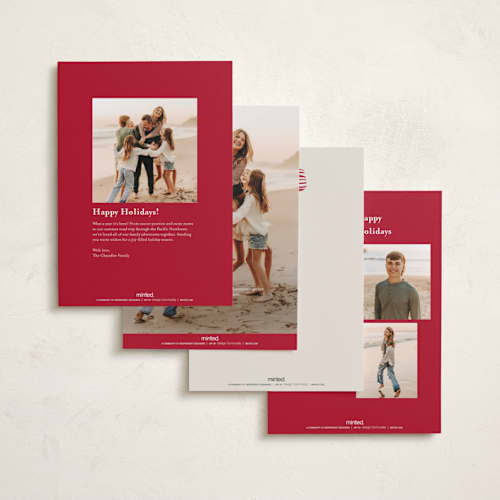 This is a cranberry foil pressed holiday cards with foil pressed by Carrie ONeal called neddy printing on recycled smooth signature in standard