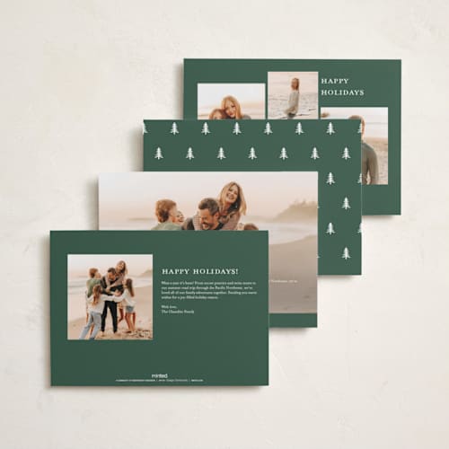 This is a spruce foil pressed holiday cards with foil pressed by Everett Paper Goods called evoke printing on recycled smooth signature in standard