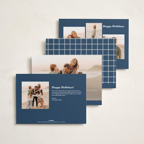 This is a navy foil pressed holiday cards with foil pressed by Lucrecia Caporale called minimal style printing on recycled smooth signature in standard