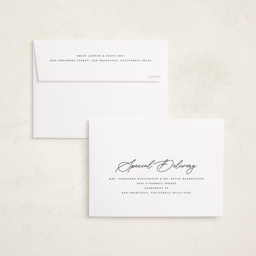 This is a snowfall foil pressed holiday cards with foil pressed by Melanie Kosuge called merry monoline printing on recycled smooth signature in standard