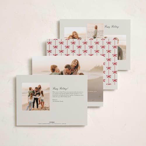 This is a poinsettia foil pressed holiday cards with foil pressed by Pixel and Hank called bow printing on recycled smooth signature in standard