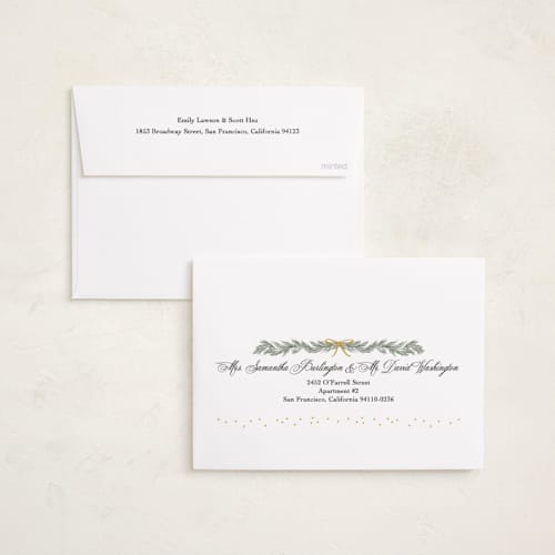 This is a midnight foil pressed holiday cards with foil pressed by Elly called ribbon garland printing on recycled smooth signature in standard
