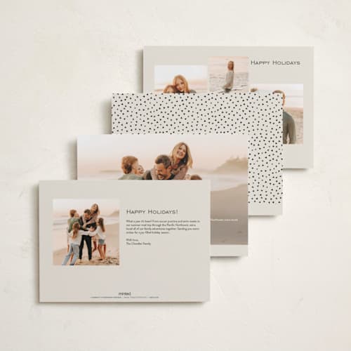 This is a snowfall foil pressed holiday cards with foil pressed by Design Lotus called gilded lettering printing on recycled smooth signature in standard
