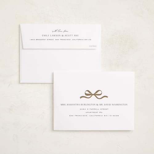 This is a snowfall foil pressed holiday cards with foil pressed by Design Lotus called gilded lettering printing on recycled smooth signature in standard