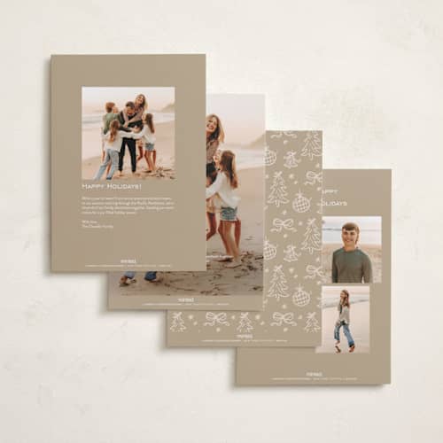 This is a vanilla foil pressed holiday cards with foil pressed by Creo Study called shimmering bow tie printing on recycled smooth signature in standard
