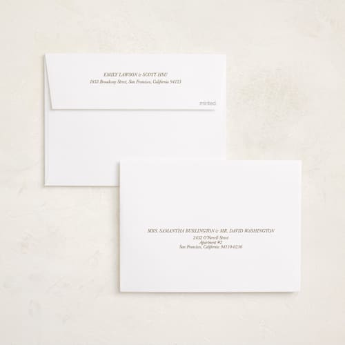 This is a cream foil pressed holiday cards with foil pressed by Megan Cash called scripted frame printing on recycled smooth signature in standard