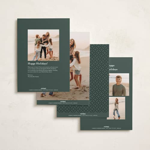 This is a evergreen foil pressed holiday cards with foil pressed by Melanie Kosuge called monogram trio printing on recycled smooth signature in standard