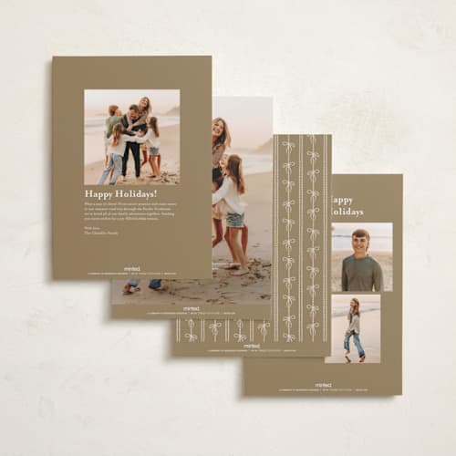 This is a buttercream foil pressed holiday cards with foil pressed by Vivian Yiwing called frame bow printing on recycled smooth signature in standard