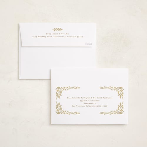 This is a buttercream foil pressed holiday cards with foil pressed by Alethea and Ruth called gilded forest printing on recycled smooth signature in standard