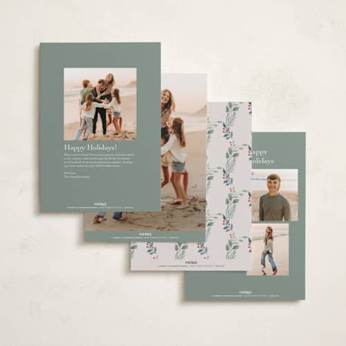 This is a holly foil pressed holiday cards with foil pressed by Elly called a gentle bow printing on recycled smooth signature in standard