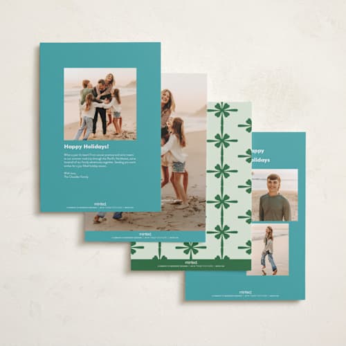 This is a turquoise foil pressed holiday cards with foil pressed by Megan Davis called sleighs printing on recycled smooth signature in standard