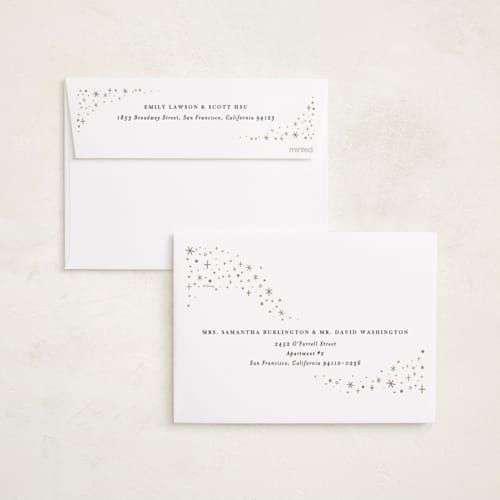 This is a ivory foil pressed holiday cards with foil pressed by Amy Payne called disney's cinderella carriage printing on recycled smooth signature in standard