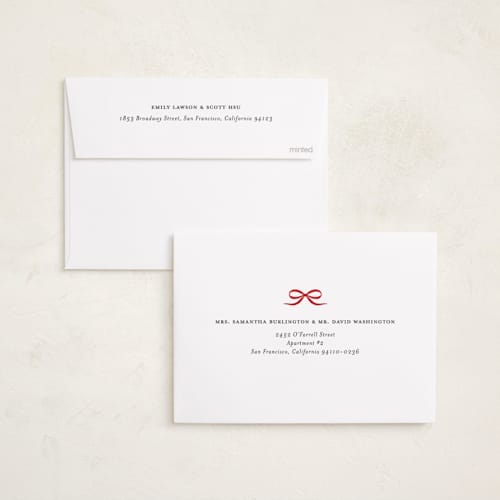 This is a pine foil pressed holiday cards with foil pressed by Paper Raven Co. called merriest ribbon printing on recycled smooth signature in standard
