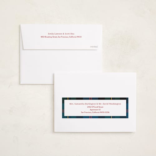 This is a navy foil pressed holiday cards with foil pressed by Ilene Guy called traditionally plaid printing on recycled smooth signature in standard