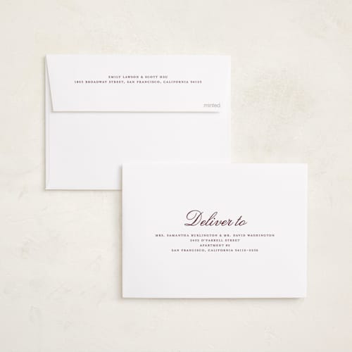 This is a cranberry foil pressed holiday cards with foil pressed by Nicole Walsh called modern script printing on recycled smooth signature in standard