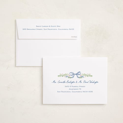 This is a coastal foil pressed holiday cards with foil pressed by Sarah Knight called striped bow printing on recycled smooth signature in standard