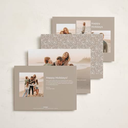 This is a marshmallow foil pressed holiday cards with foil pressed by Heather Schertzer called darling printing on recycled smooth signature in standard