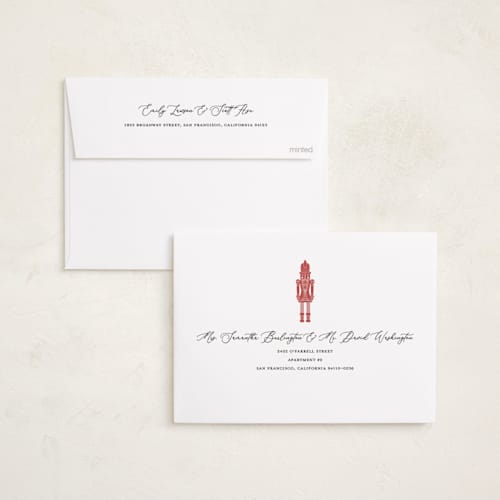 This is a holly berry foil pressed holiday cards with foil pressed by Anne Ciotola called golden nutcrackers printing on recycled smooth signature in standard